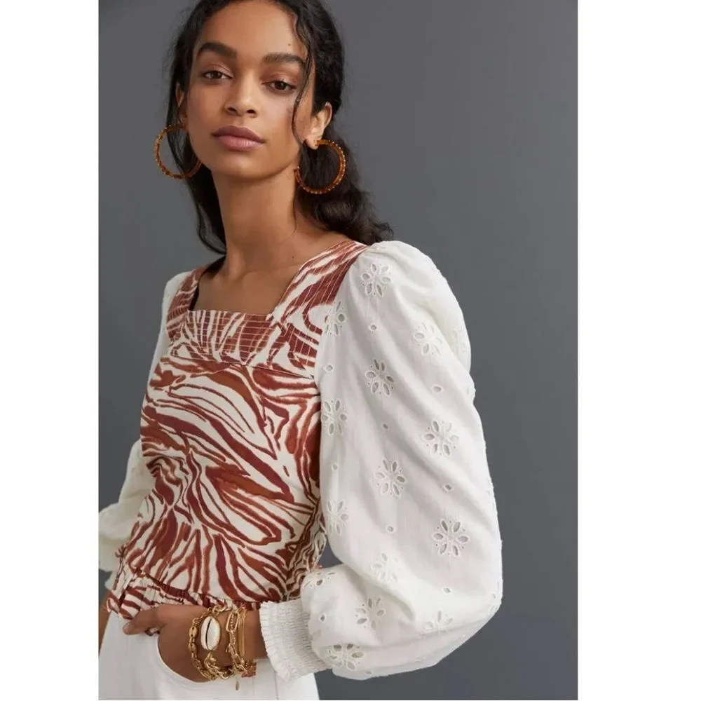 Anthropologie love the‎ label zebra laser cut puff sleeve smocked blouse